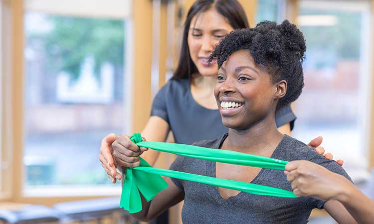 woman exercising for rehabilitation therapy