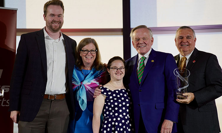 Group photo with Matt McCarthy, Mary Beth McMahon, Melissa Reilly, Jim Brett, and Gerry Morrissey at Special Olympics award ceremony