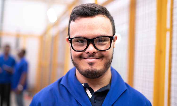 Headshot of young man wearing glasses